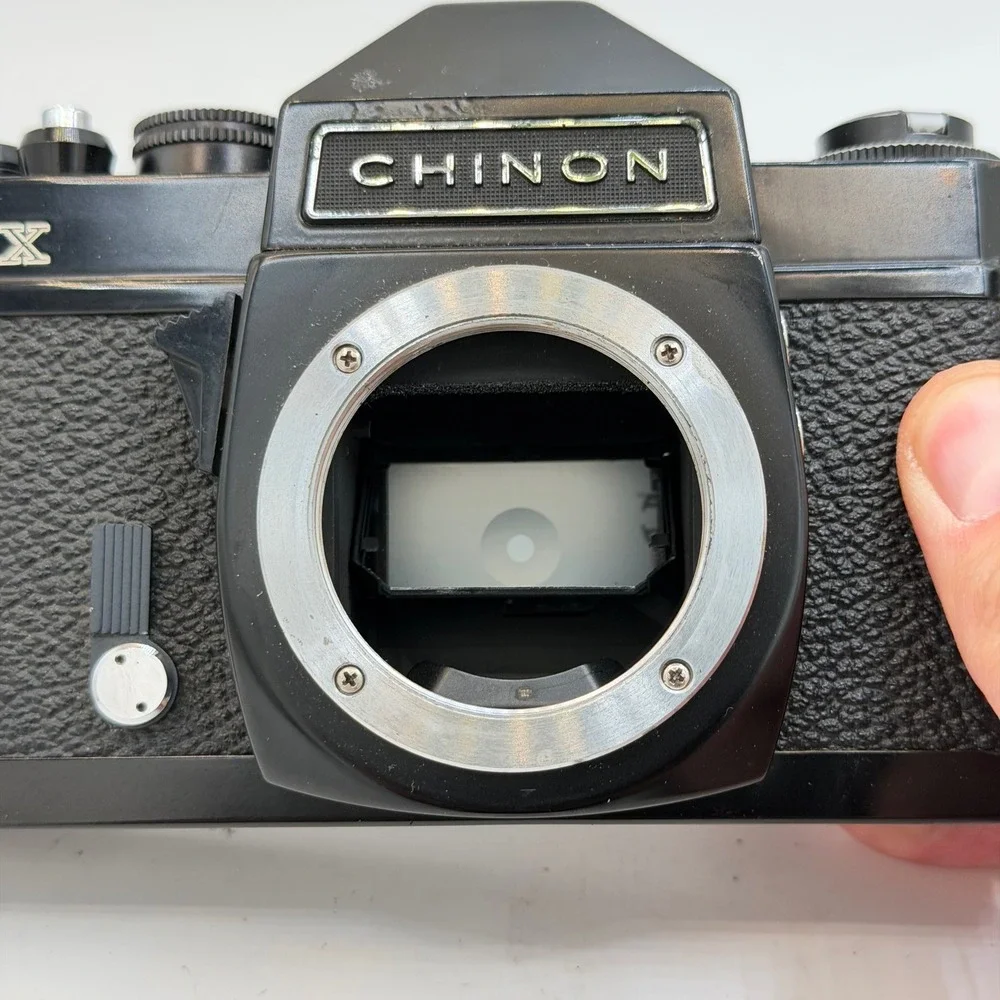 Chinon CX 35mm SLR Film Camera with Auto Chinon 55mm f1.7 Lens Black Japan